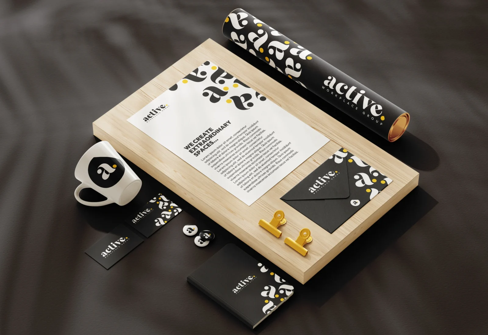 Branded stationery on wooden surface.