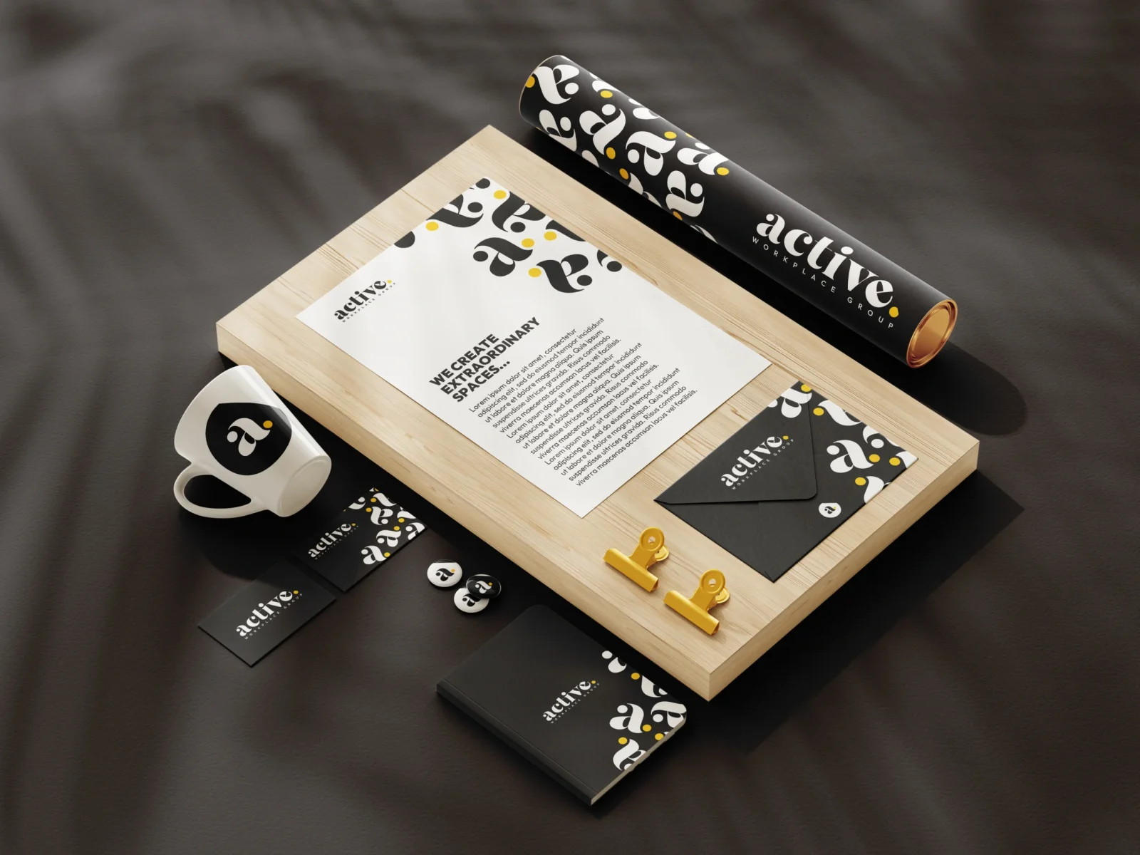 Branded stationery on wooden surface.